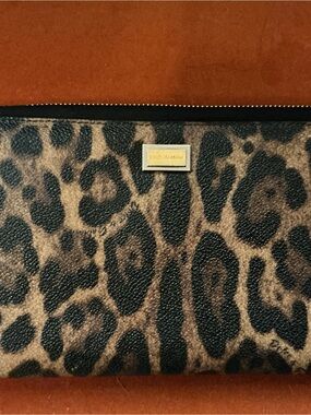 Dolce & Gabbana Silver Logo Zip Pull on Rust Brown Leather